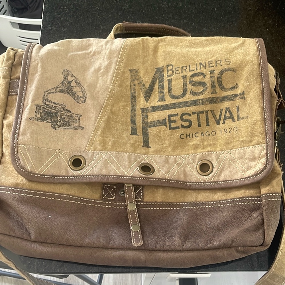 Cross body bag made from repurposed army duffle bags